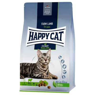 Sac de croquettes Happy Cat Farm Lamb 1+ years, image d’un chat tigré allongé, texte Culinary Weide Lamm, icônes animaux, mention Natural Life Concept, sans conservateurs ajoutés.