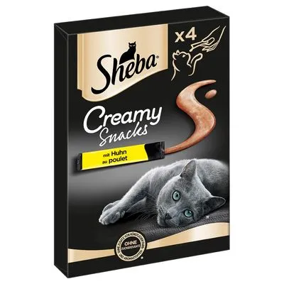 Sheba Creamy Snacks x4, met Huhn au poulet. Verpakking toont kat en snacktextuur. Zonder kunstmatige kleurstoffen of conserveermiddelen volgens zichtbaar zegel.