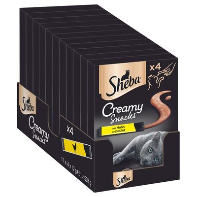 Sheba Creamy Snacks met kip, verpakking van 11 x 4 stuks à 12 g, afbeelding van kat en snack, tekst: 'mit Huhn au poulet', merknaam Sheba duidelijk zichtbaar.