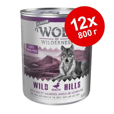 Консервы Wolf of Wilderness Senior Wild Hills, 12×800 г, надпись: 100% grain-free. На упаковке изображён волк и горный пейзаж. Консервы Wolf of Wilderness Senior Wild Hills, 12×800 г, надпись: 100% grain-free. На упаковке изображён волк и горный пейзаж.