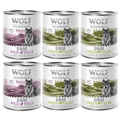 6 dåser Wolf of Wilderness Senior hundemad, varianter Wild Hills og Green Fields, 800 g. Tekst: 100% grain-free recipe, fresh duck & veal eller fresh lamb & chicken with wild berries, roots and wild herbs.