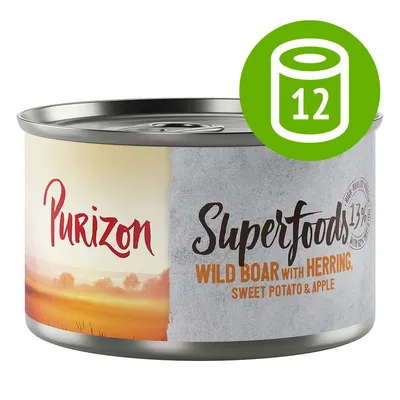 Purizon Superfoods Wild Boar with Herring, Sweet Potato & Apple. Opakowanie 12 puszek. Widoczna etykieta produktu na tle krajobrazu.