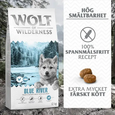 Wolf of Wilderness Blue River 12 kg, fresh chicken meat with salmon. Hög smältbarhet, 100 % spannmålsfritt recept, extra mycket färskt kött. Bild på foderbitar.