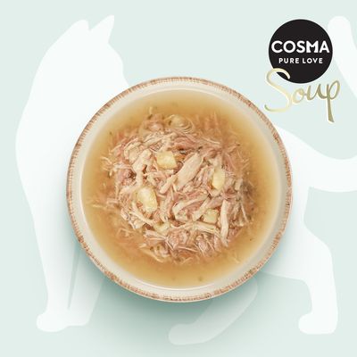 Cosma Pure Love Soup. En skål med köttbitar i buljong framför ett stiliserat kattmotiv.
