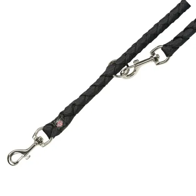 Guinzaglio nero intrecciato in tessuto con due moschettoni metallici e anello, etichetta visibile con scritta 'Karlie'.