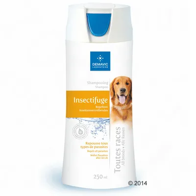 Demavic Insectifuge repellent shampoo, 250ml bottle, states it repels all types of parasites and is suitable for all breeds. Visible text in French, English and German. Demavic Insectifuge repellent shampoo, 250ml bottle, states it repels all types of parasites and is suitable for all breeds. Visible text in French, English and German.