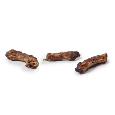 Three dried pieces of meat on a white background, each visible in its natural form and structure.