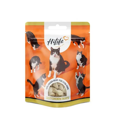 Pouch labelled '100% chicken breast. Plus extra purrs.' and 'tasty chicken treats', with visible pieces of treat inside a clear window.