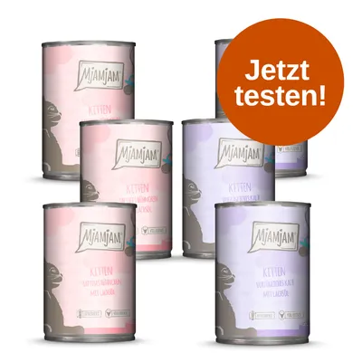 MjAMjAM Kitten Nassfutterdosen in verschiedenen Sorten, Aufschrift 'Jetzt testen!' auf orangem Kreis. MjAMjAM Kitten Nassfutterdosen in verschiedenen Sorten, Aufschrift 'Jetzt testen!' auf orangem Kreis.
