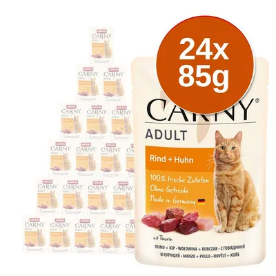 Carny Adult Rind + Huhn macskaeledel, 24 x 85 g csomag. Felirat: 100% friss összetevők, gabonamentes, Made in Germany. Marha és csirke ízesítés. Carny Adult Rind + Huhn macskaeledel, 24 x 85 g csomag. Felirat: 100% friss összetevők, gabonamentes, Made in Germany. Marha és csirke ízesítés.