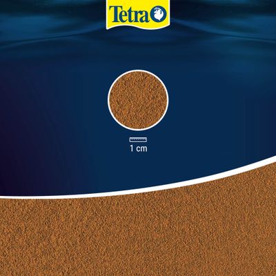 Tetra. A tápszemcsék részletes nézete mérőskálával, a szemcseméret körülbelül 1 cm.