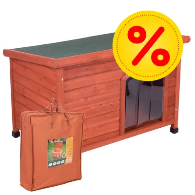 Holzhundehütte mit grünem Dach und transparenter Tür, inklusive brauner Tragetasche. Gelbes Prozentzeichen für Rabatt sichtbar.