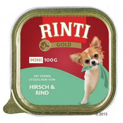 Опаковка Rinti Gold MINI 100 г, с текст на немски: Mit feinen Stückchen von Hirsch & Rind. Изображение на малко куче отпред.