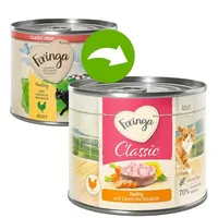 Changement de design : deux boîtes Feringa Classic Adult, volaille avec carottes et pissenlit. Ancien et nouveau packaging visibles, texte en anglais sur les étiquettes.