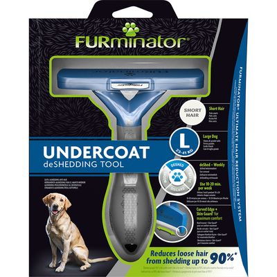 FURminator Undercoat deShedding Tool per cani a pelo corto, taglia L 23–41 kg. Testo visibile: riduce la perdita di pelo fino al 90%, uso settimanale, lama curva, immagine cane giallo.