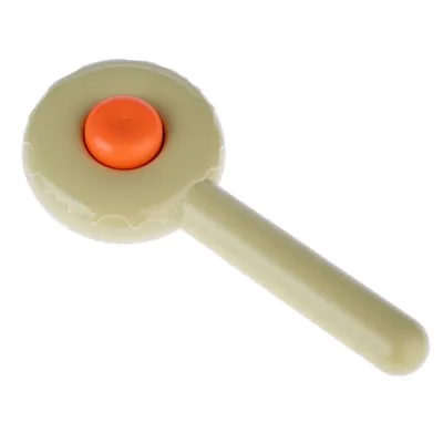 Handlicher Klicker mit orangefarbenem Knopf für Training oder Interaktion, beige Kunststoffgehäuse. Handlicher Klicker mit orangefarbenem Knopf für Training oder Interaktion, beige Kunststoffgehäuse.