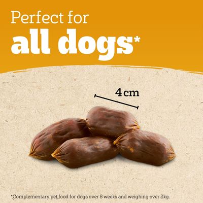 Text states perfect for all dogs. Image shows four sausage-shaped treats, each 4 cm long. Note: complementary pet food for dogs over 8 weeks and weighing over 2 kg.