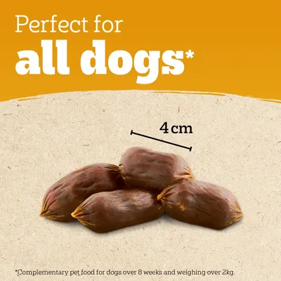 Text states perfect for all dogs. Image shows four sausage-shaped treats, each 4 cm long. Note: complementary pet food for dogs over 8 weeks and weighing over 2 kg.