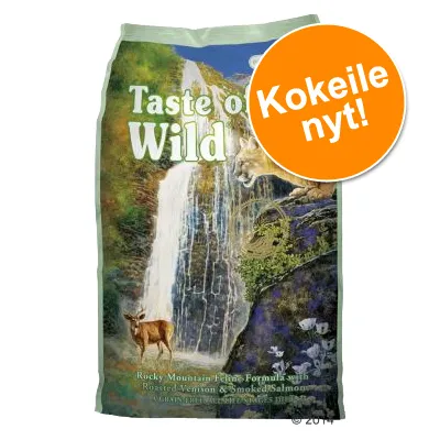 Taste of the Wild -pussi, etupuolella teksti 'Kokeile nyt!'. Näkyvissä myös vesiputous ja eläinhahmoja pakkauksessa. Alareunassa englanninkielistä tuotetekstiä.