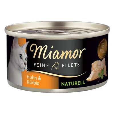 Miamor Feine Filets, pollo e zucca, nature, 100% filetto. Cibo per gatti in lattina con immagine di un gatto bianco e pezzi di filetto di pollo.
