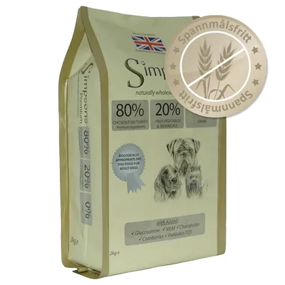 Simpsons Premium torrfoder för vuxna hundar, 2 kg. 80 % kyckling/fisk/kalkon, 20 % frukt/grönsaker/örter. Spannmålsfritt-märke synligt. Tillägg: glukosamin, MSM, kondroitin, tranbär, prebiotika.