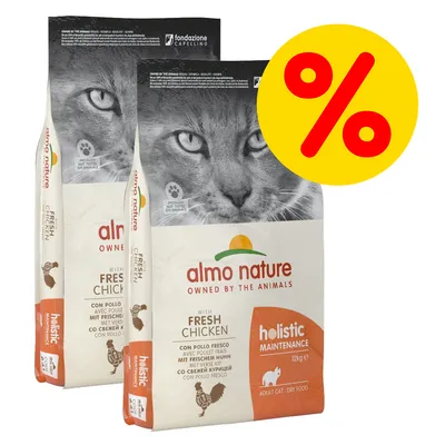 Dwie torby karmy dla kotów almo nature holistic maintenance 12 kg z kurczakiem, widoczne logo i napis „with fresh chicken”, żółta ikona procentowa oznaczająca promocję.