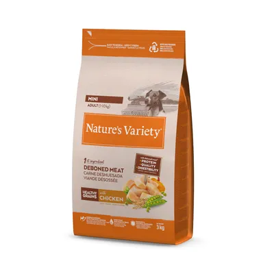 Sac Nature’s Variety Mini Adult 1–10 kg, viande désossée, céréales complètes, poulet, 3 kg. Texte visible : protéine, qualité, digestibilité. Image de morceaux de poulet et légumes.