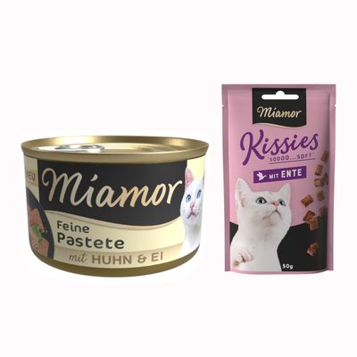 Miamor Feine Pastete mit Huhn, boîte de pâtée pour chat avec image d’un chat blanc et texte en allemand sur l’étiquette.