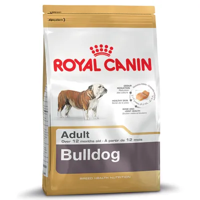 Bag labelled Royal Canin Bulldog Adult, over 12 months old. Highlights: odour reduction, healthy skin, bone and joint health, exclusive kibble shape shown.