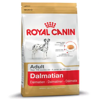 Bag labelled for adult Dalmatian, over 15 months old. Highlights urinary tract health, healthy skin, healthy cardiac function, and exclusive kibble. Text in multiple languages.
