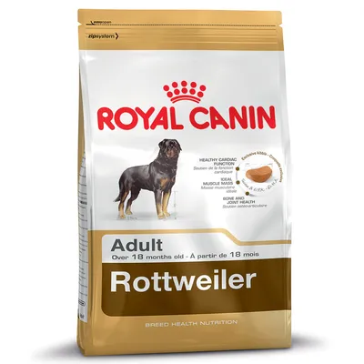 Bag labelled Royal Canin Rottweiler Adult, over 18 months old. Highlights: healthy cardiac function, ideal muscle mass, bone and joint health, exclusive kibble shape shown.