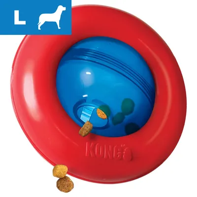 Red and blue treat dispensing toy with food pieces falling out, size L indicated in top left corner with a dog silhouette. Red and blue treat dispensing toy with food pieces falling out, size L indicated in top left corner with a dog silhouette.