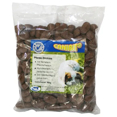 CANIBIT Pferde-Stickies, 500g pose. Tekst: mit feinstem Pferdefleisch, Hundesnack für zwischendurch, von Meisterhand gebacken. High Quality mærke synligt.