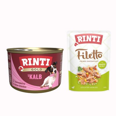 RINTI Gold mit Geflügelherzen, getreidefrei, in feinen Stücken. Abbildung einer Dose mit Hund auf der Verpackung.