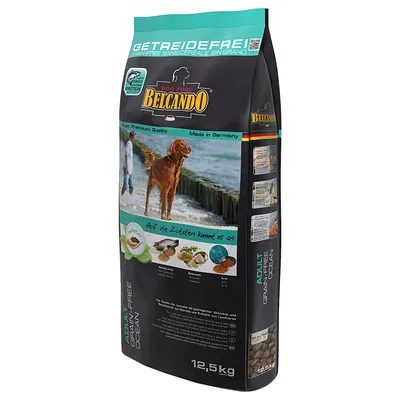 Balení Belcando Dog Food Adult Grain-Free Ocean 12,5 kg, nápisy Getreidefrei, Super Premium Quality, Made in Germany, obrázek psa na pláži, vyobrazené suroviny a granule.
