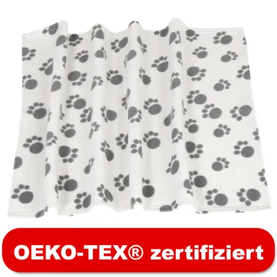 Weisse Decke mit grauen Pfotenmustern, OEKO-TEX® zertifiziert.