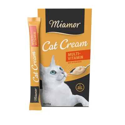 Miamor Cat Cream Multi-Vitamin, boîte de 6 x 15 g, texte visible : mit Vitaminen, + Taurin & Spurenelemente. Stick individuel et emballage avec image de chat. Miamor Cat Cream Multi-Vitamin, boîte de 6 x 15 g, texte visible : mit Vitaminen, + Taurin & Spurenelemente. Stick individuel et emballage avec image de chat.