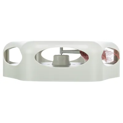 Toy with white plastic casing and integrated spring, visible through oval openings.