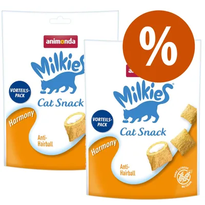 Dva balíčky animonda Milkies Cat Snack Harmony Anti-Hairball, nápisy VORTEILS-PACK a velké oranžové procento. Na obalu vyobrazeny polštářky s krémovou náplní.