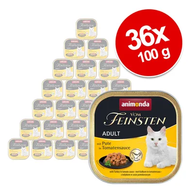 Animonda Vom Feinsten Adult kalkkunalla tomaattikastikkeessa, 36 x 100 g. Märkäruoka kissoille, pakkauksessa valkoinen kissa ja ruokaesittely. Animonda Vom Feinsten Adult kalkkunalla tomaattikastikkeessa, 36 x 100 g. Märkäruoka kissoille, pakkauksessa valkoinen kissa ja ruokaesittely.