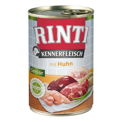 RINTI Kennerfleisch mit Huhn Senior dåse. Synlig tekst: fettreduceret, kornfri, fibre. Billede af forskellige typer kød og grøntsager på etiketten.