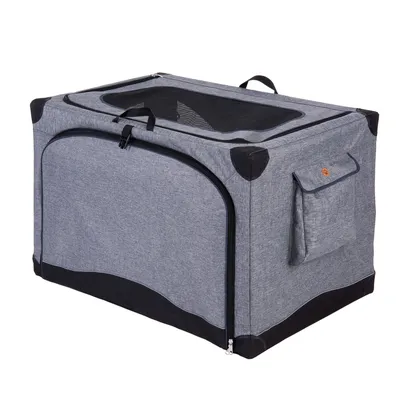 Transportbox van grijze stof met zwart netvenster bovenaan, ritssluiting aan de voorkant en zijvak. Versterkte hoeken, draaggreep zichtbaar.