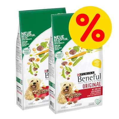 2 sacos de Purina Beneful Original, texto visible en alemán e inglés, imagen de perro y verduras. Símbolo de porcentaje amarillo indica oferta o descuento. 2 sacos de Purina Beneful Original, texto visible en alemán e inglés, imagen de perro y verduras. Símbolo de porcentaje amarillo indica oferta o descuento.