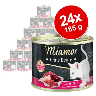 Miamor Feine Beute kattemad, 24 x 185 g dåser. Tekst: 7 Sieben Sorten Fleisch & Innereien, mit Rind, getreidefrei. Billede af hvid kat og kød på emballagen.