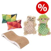 Set mit zwei bunten Kissen, zwei Plüschigeln und einer gewellten Kratzpappe. Rotes Prozentzeichen oben rechts deutet auf ein Angebot hin.