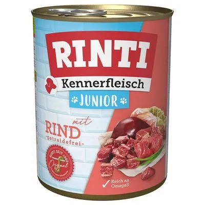 RINTI Kennerfleisch Junior met rund, getreidefrei, rijk aan Omega 3. Afbeelding van vleesblokjes en orgaanvlees op het blik. Tekst in het Duits zichtbaar. RINTI Kennerfleisch Junior met rund, getreidefrei, rijk aan Omega 3. Afbeelding van vleesblokjes en orgaanvlees op het blik. Tekst in het Duits zichtbaar.