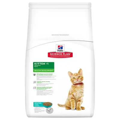 Hill's Science Plan Kitten <1 Healthy Development con atún. Imagen de un gato naranja. Texto en inglés sobre antioxidantes, digestión y órganos vitales. Saco blanco.