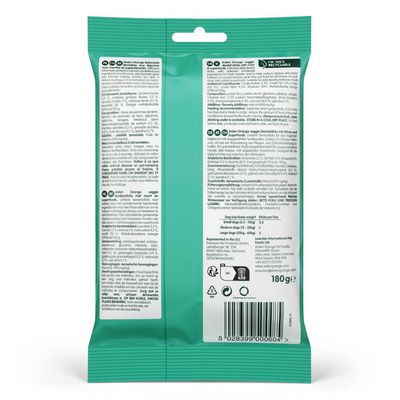 Back of product pack showing ingredients, feeding guide by dog size, storage instructions, recycling symbols and barcode. Text in multiple languages. Net weight: 180g.