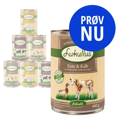 Lukullus vådfoder til hund, dåse med tekst 'Ente & Kalb', 400 g. Synlige varianter: Ged & Lam, Rind & Truthahn. Blå cirkel med teksten 'PRØV NU'.