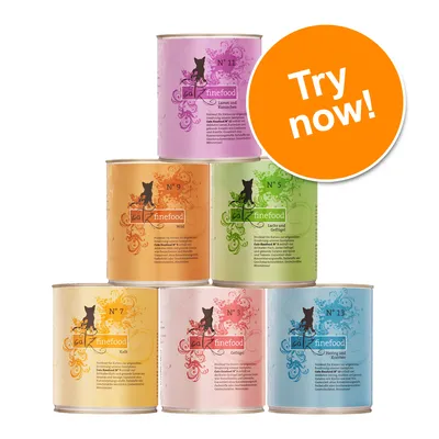 Six cans of catz finefood with visible numbers 3, 5, 7, 9, 11, 13 in various colours. Large orange badge reads: Try now!